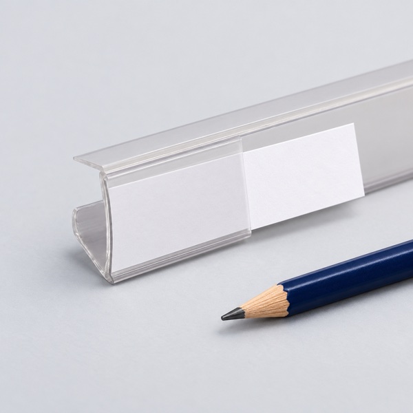 Replaceable paper ticket in a clear shelf label holder
